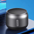 Lenovo portable wireless speaker, water resistant, with surround sound and bass.
